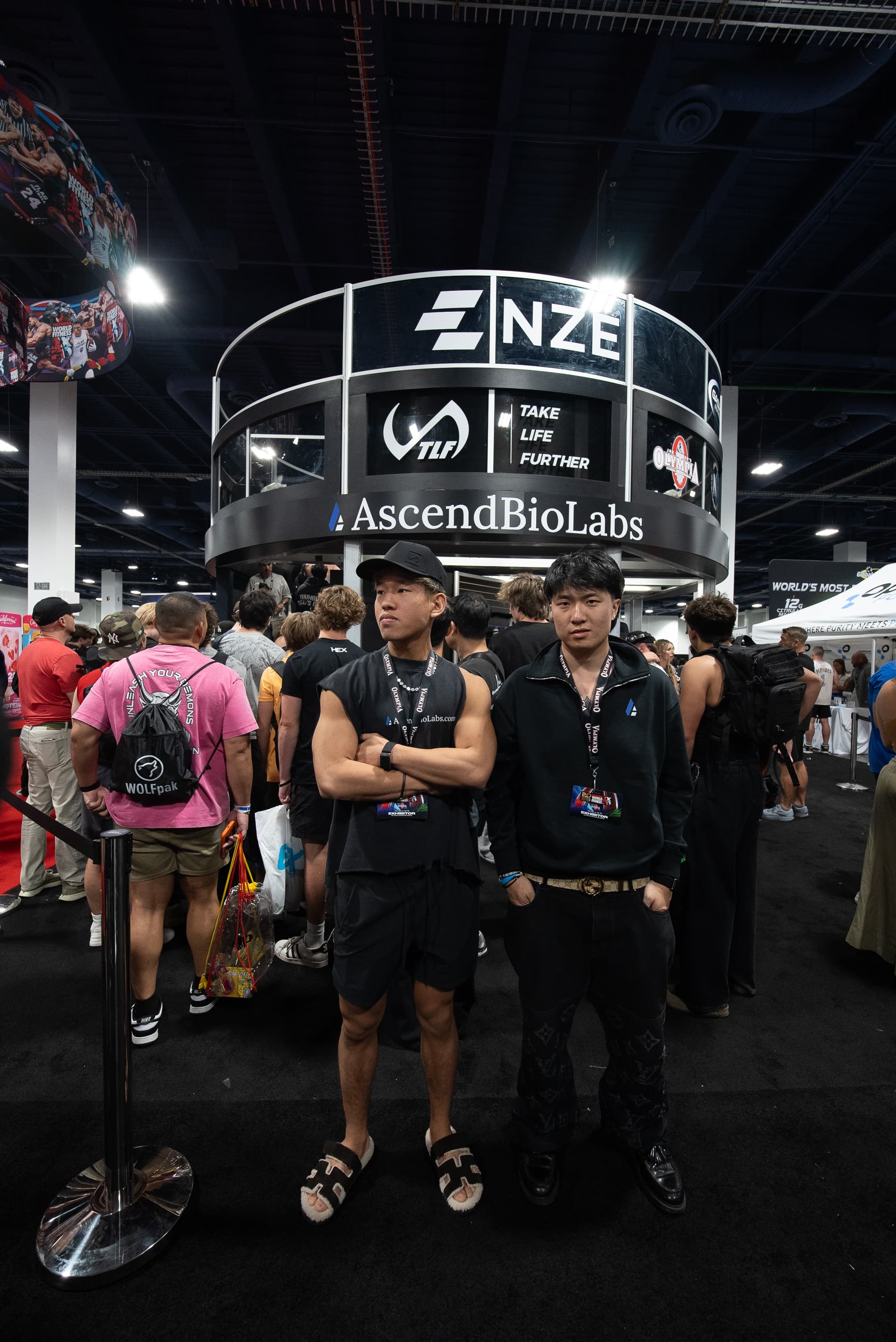 Group photo in front of the AscendBioLabs booth